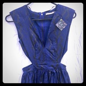 NWT Nasty Gal Dress with deep V and side cut outs